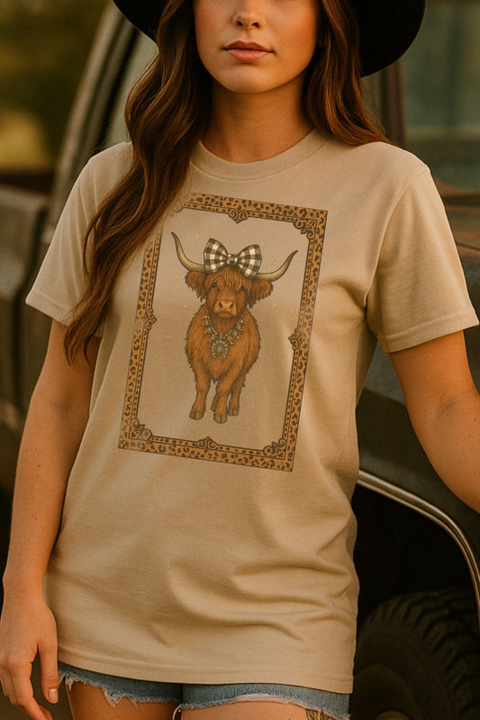 Highland Cow Bow & Turquoise Leopard Frame Gildan Sand Shirt – Graphic Tee, Long Sleeve & Crewneck.