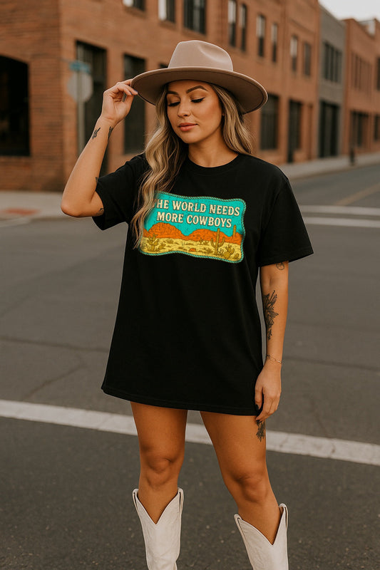 The World Needs More Cowboys Kids–Adult Gildan Black Shirt – Graphic Tee, Long Sleeve & Crewneck.